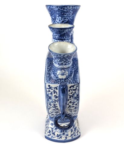 ASIA
FIVE-ARMED FLOWER VASE made of white...