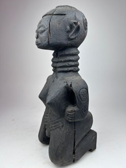 AFRICAN-STYLE FEMALE STATUETTE
Wood with...