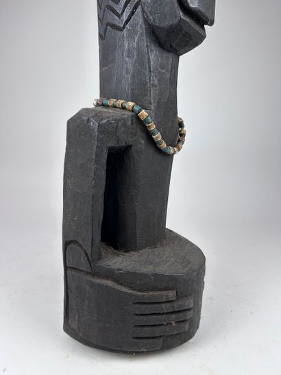 Tribal-style BUST
Wood with black patina,...