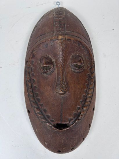 SET OF FOUR AFRICAN-STYLE MASKS
Wood with...