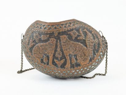 KASHKUL in gilded and chased brass, decorated...