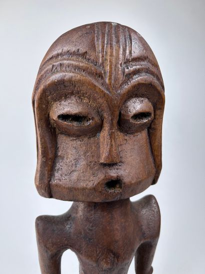 SET OF TWO AFRICAN-STYLE STATUETTES
Wood,...