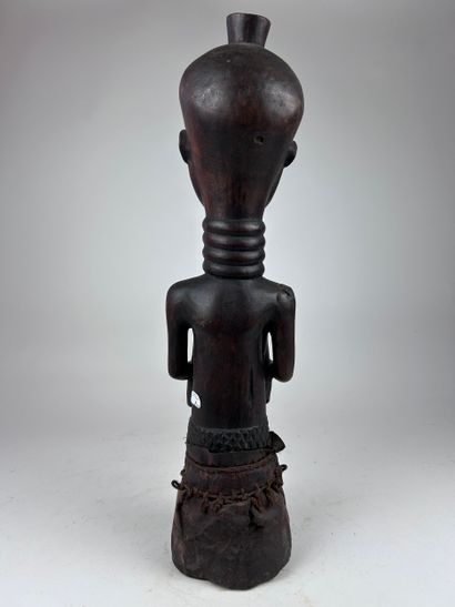 AFRICAN-STYLE STATUE
Wood with a dark brown...