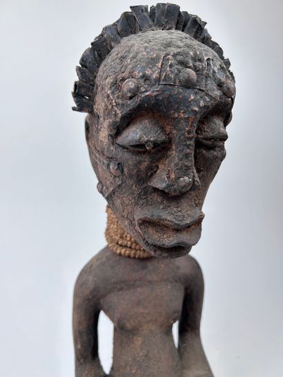 SET OF TWO AFRICAN-STYLE STATUETTES
Wood,...