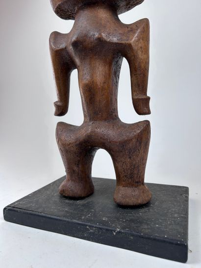 SET OF TWO AFRICAN-STYLE STATUETTES
Wood,...