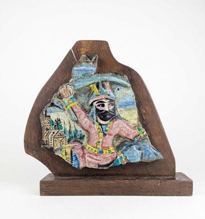 A section of a polychrome glazed ceramic...