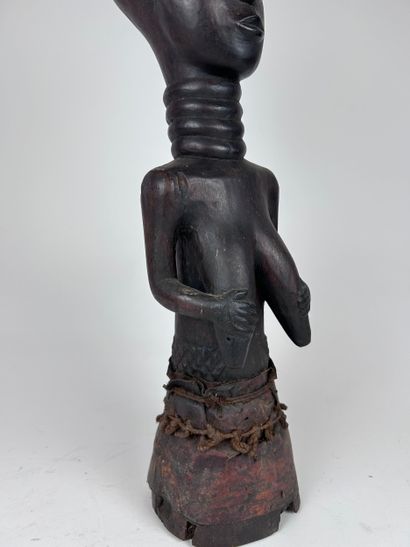 AFRICAN-STYLE STATUE
Wood with a dark brown...