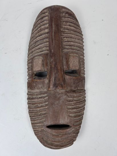SET OF FOUR AFRICAN-STYLE MASKS
Wood with...