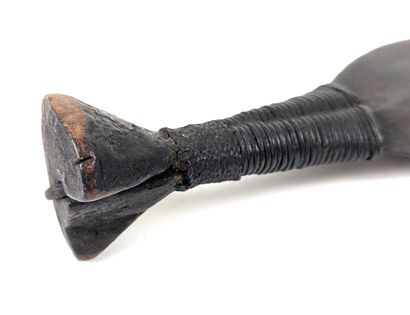 Short double-edged sword with a hilt decorated...