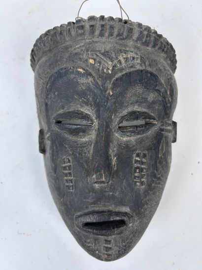SET OF THREE AFRICAN-STYLE MASKS
Wood with...