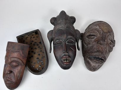 SET OF TWO MASKS and ONE AFRICAN-STYLE BOX
Wood...