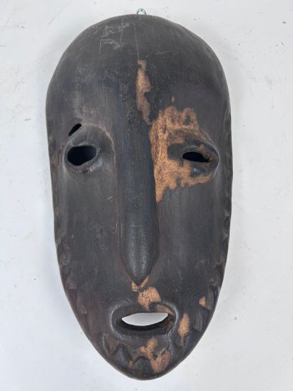 SET OF THREE AFRICAN-STYLE MASKS
Wood with...
