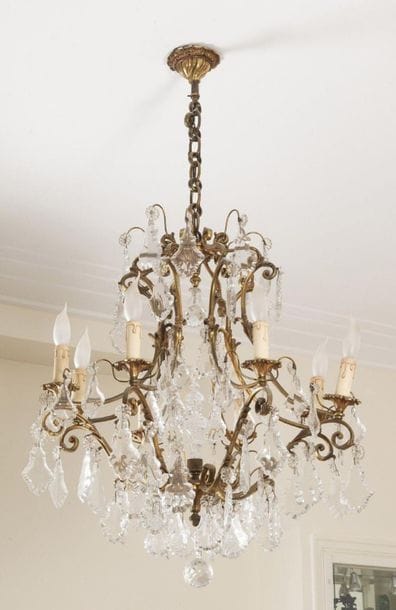 Lustre cage en bronze doré à huit feux de...