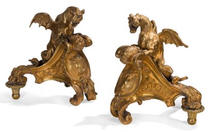 Paire de chenets en bronze ciselé et doré...