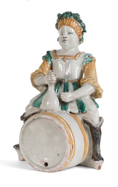 SAINTONGE
Statuette en faïence polychrome...