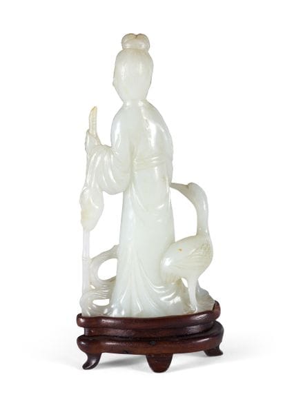 CHINA - 20th century
Celadon nephrite group...