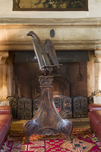 Carved, molded and patinated fruitwood lectern...