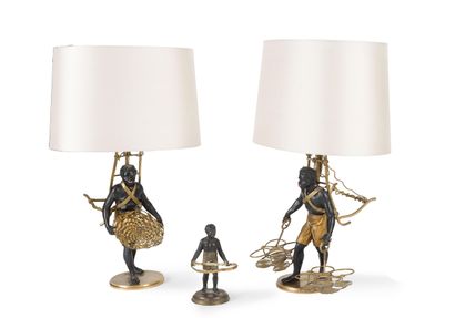 Pair of lacquered and gilded metal statuettes...