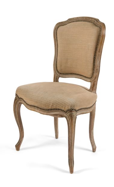 Suite of four chairs in molded wood with...