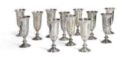 Twelve silver goblets on pedestal
Weight:...