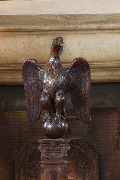 Carved, molded and patinated fruitwood lectern...