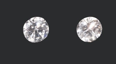 Two brilliant-cut diamonds
Weight: 0.219...