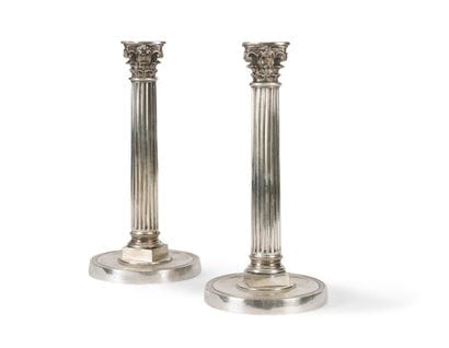 Pair of silver-plated candlesticks in the...