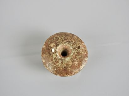 Probablement masse d’arme miniature ou contrepoids...
