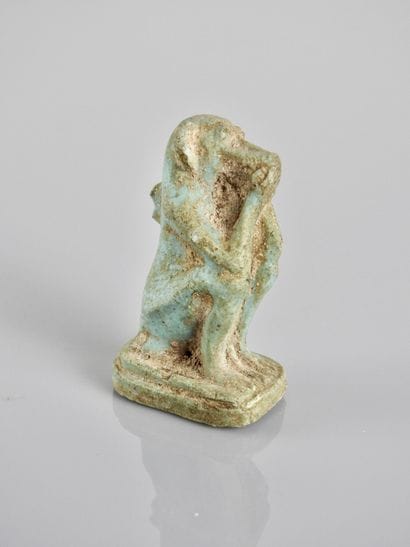 Singe cynocéphale.

Amulette avec manque...