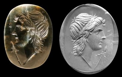 Intaille.Dieu Apollon un thyrse dans le champ.

Pierre...