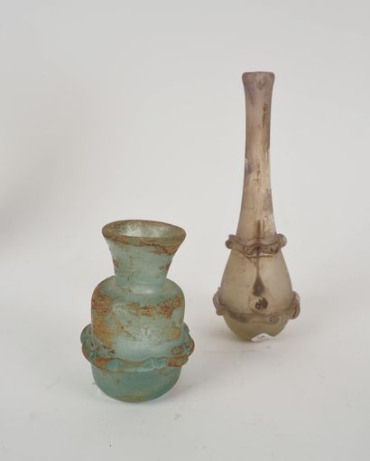 
2 small glass vases in the taste of the...