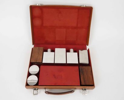 Hermès, travel kit in havana leather including...