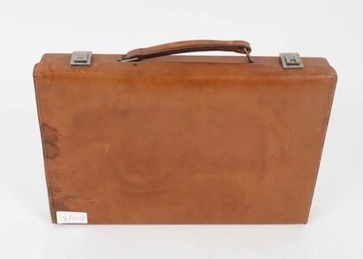Hermès, travel kit in havana leather including...
