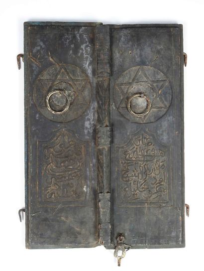 
Pair of carved wood and Islamic calligraphy...
