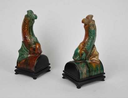 China 

Two glazed stoneware ridge tiles...