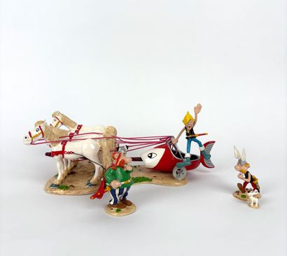 UDERZO
Asterix
Goudurix jumping from his...