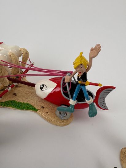 UDERZO
Asterix
Goudurix jumping from his...