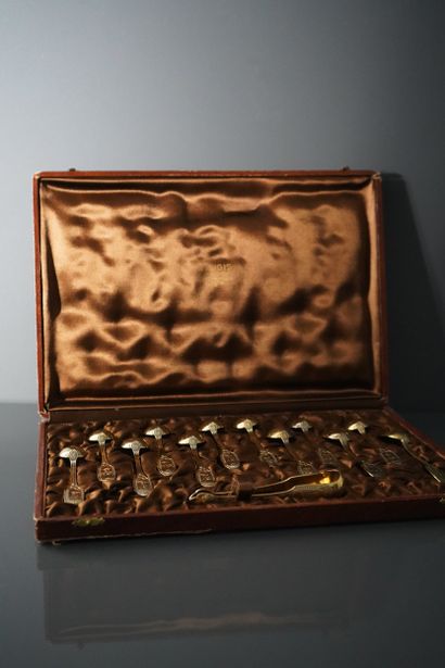 Suite of 12 vermeil coffee spoons and one...