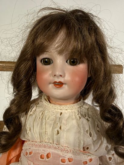 SFBJ

Doll with porcelain head, wooden body,...