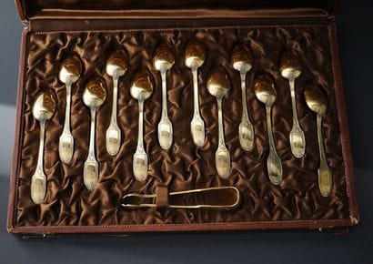 Suite of 12 vermeil coffee spoons and one...