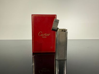 CARTIER Paris

Briquet en plaqué argent

Signé...