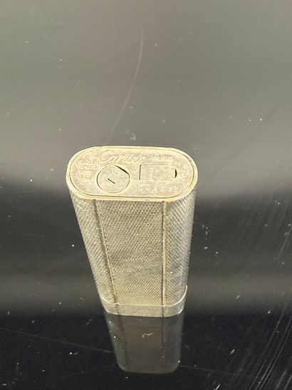 CARTIER Paris

Briquet en plaqué argent

Signé...