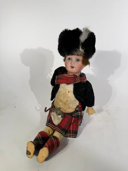WS GERMANY

Little Scottish boy doll, porcelain...
