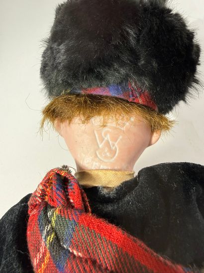 WS GERMANY

Little Scottish boy doll, porcelain...