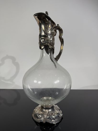 Glass ewer with silver-plated metal frame...