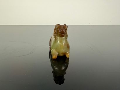 Chine, XXe

Statuette en jade roux et céladon...