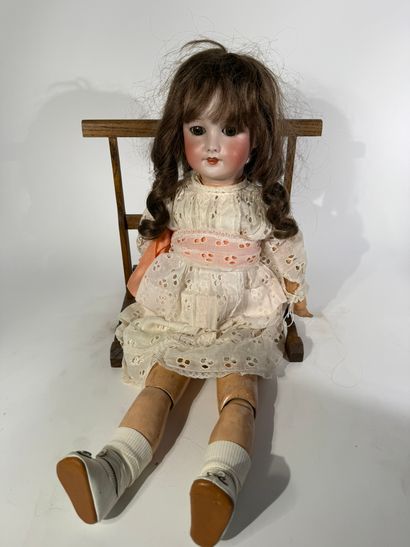 SFBJ

Doll with porcelain head, wooden body,...