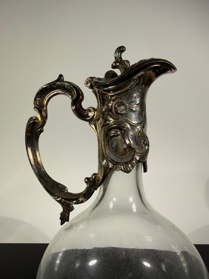Glass ewer with silver-plated metal frame...