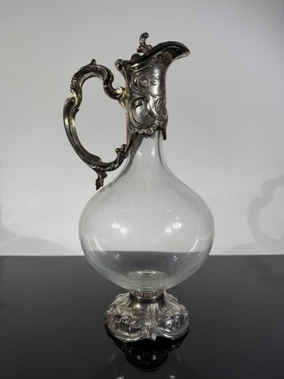 Glass ewer with silver-plated metal frame...