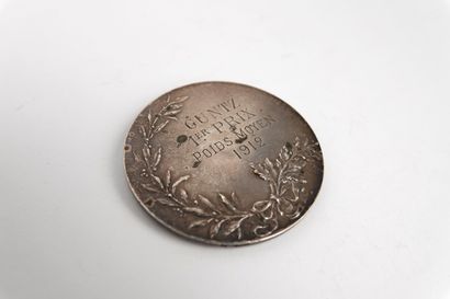 Lutte / Haltérophilie / Force
Médaille circulaire...